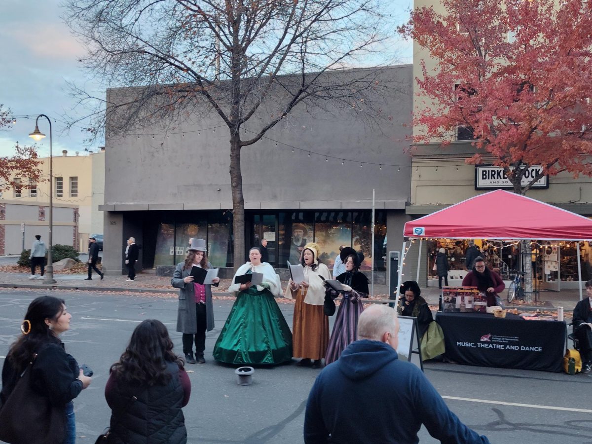 Carolers during the Christmas preview.